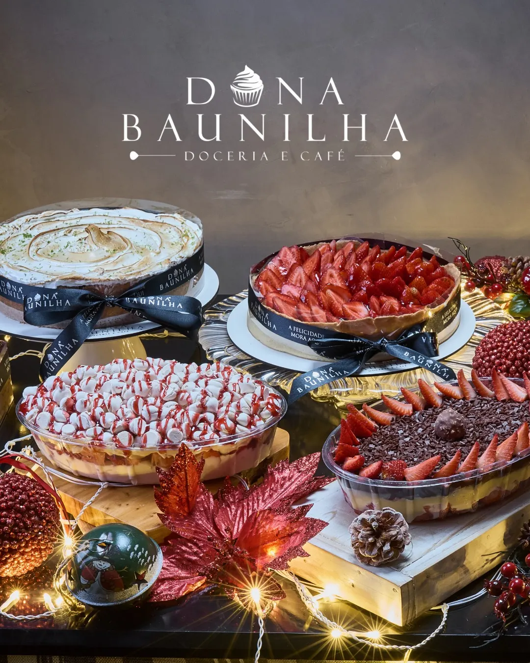 Mesa de encomendas da Dona Baunilha: torta de limão, torta de morango, merengue e pacumê